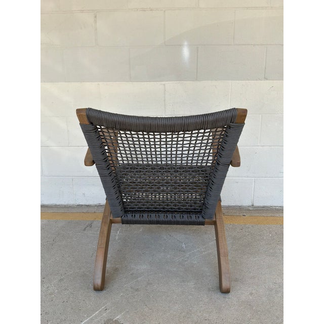 Stylish Modern Adirondack Style Outdoor Chairs Pair. Warm wood frame, tapered legs and woven black cord seat. Showroom...