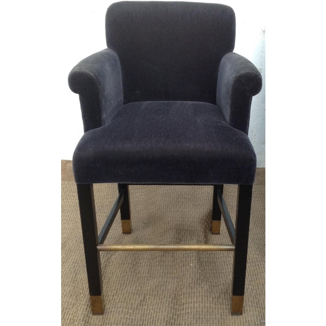 Wonderful plush slate-blue mohair barstools by iconic Donghia. Legs are ebonized with brass foot rests. Set of four....