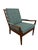 This striking Mid-Century Danish Modern arm chair showcases the clean lines, warm materials, and timeless craftsmanship...