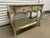 This is a stunning accent table by Hickory Chair Company. Perfectly distressed for that classic time worn aesthetic....