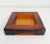 Brutalist style, thick art glass ashtray or catchall in the style of Blenko Glass. It is a deep amber/copper color and...