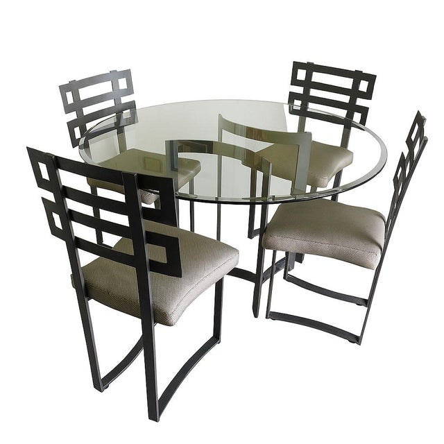 Elevate your dining space with this elegant and architectural five-piece Journey Dining Set by Johnston Casuals,...