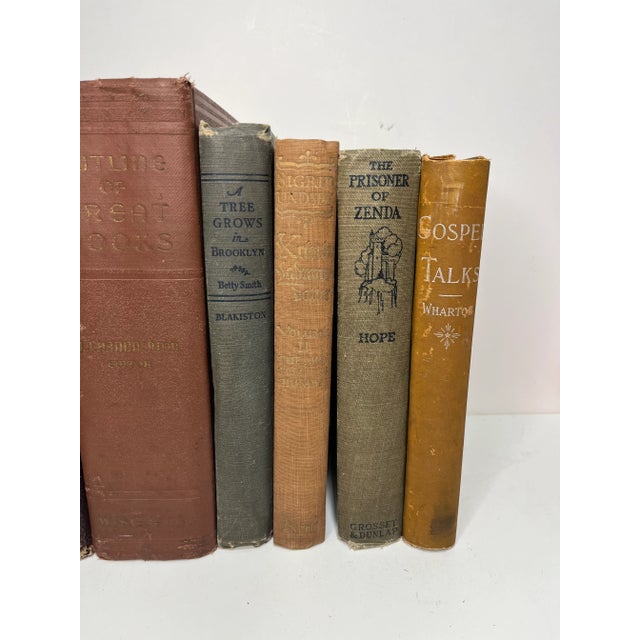 Set of 10 vintage and antique books in shades of neutrals. Varying subject matters and sizes. Condition varies and most...