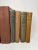 Set of 10 vintage and antique books in shades of neutrals. Varying subject matters and sizes. Condition varies and most...