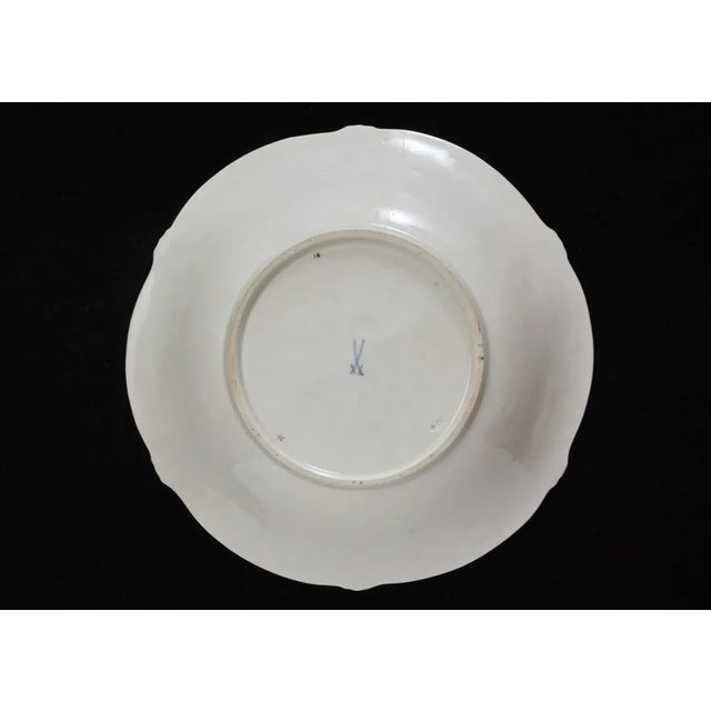 Antique Meissen porcelain centerpiece bowl, decorated with richly gilt leaves and multicolored flowers on a white...