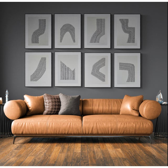 This piece features an abstract configuration on paper of tiny circles drawn with black ink enclosed in pencil frame....