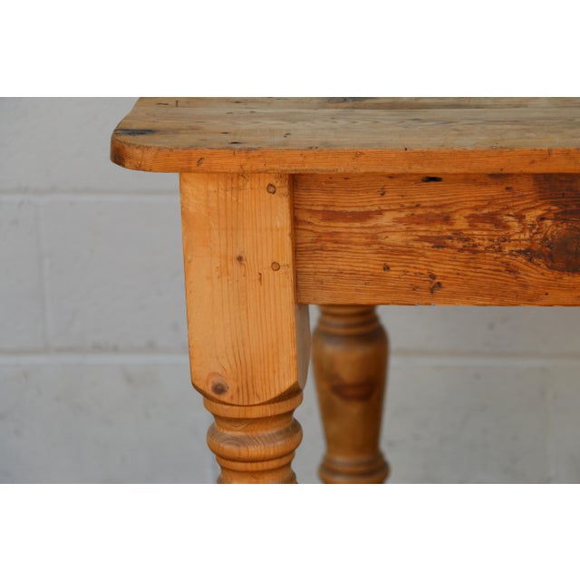 Beautiful vintage solid pine farmhouse dining table from the 1990s, featuring classic country styling and a warm,...
