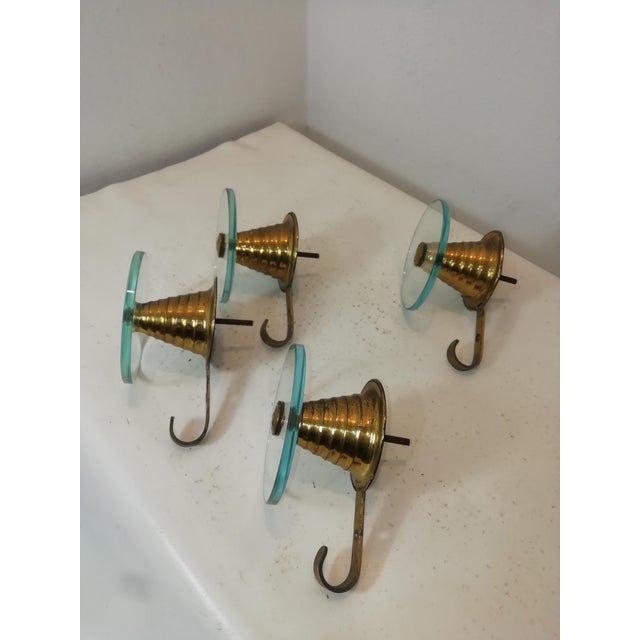 Beautiful set of original vintage brass and glass coat hangers or hooks. Designed by Fontana Arte. Original Nile green...
