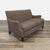 Features rounded, rolled arms and a tailored appearance with wood legs in a dark finish. Brand: Cisco Brothers. Dimensions...