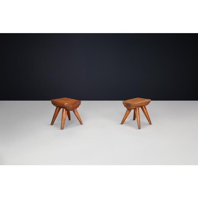 Brutalist Solid Pine Stools, France, 1960s – Set of 12 Available (Priced Per Stool) A striking collection of twelve...