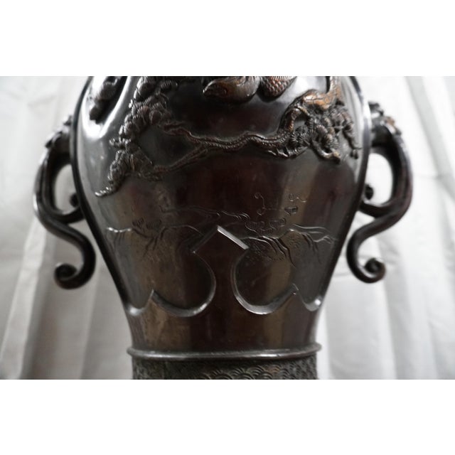 Late 19th Century Monumental Japanese Patinated Bronze Crane Floor Vase With Shishi Lion Handles | Meiji Style For Sale - Image 5 of 12