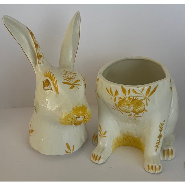 Ceramic Italian bunny rabbit cookie jar, hand painted with yellow flowers.