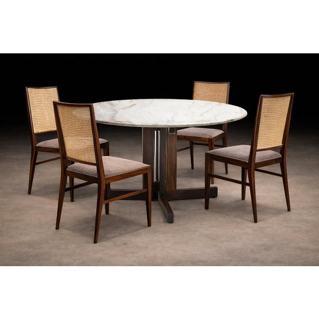 A disciplined and architecturally resolved set of four Brazilian Modern dining chairs by Celina, produced in the 1960s and...