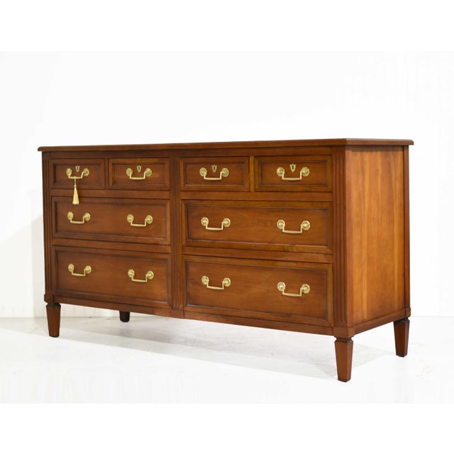 Elevate your home with this stunning Mid Century 8 Drawer Chest by Henredon Heritage. Crafted from solid wood, this...