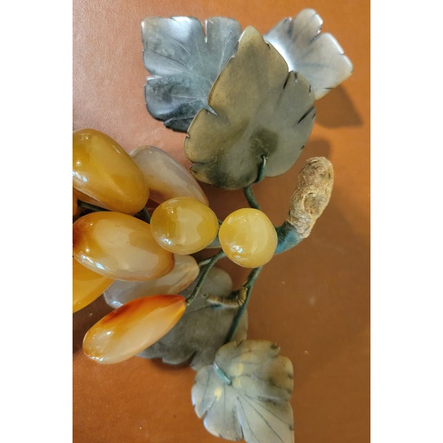 This Vintage MCM Stone Red Grapes Cluster & Leaves is a true collector's item. The large grape cluster is made of polished...