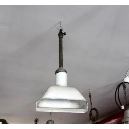 Nine white porcelain industrial style light fixtures in good original condition. Fresh out of a factory in the east. Very...