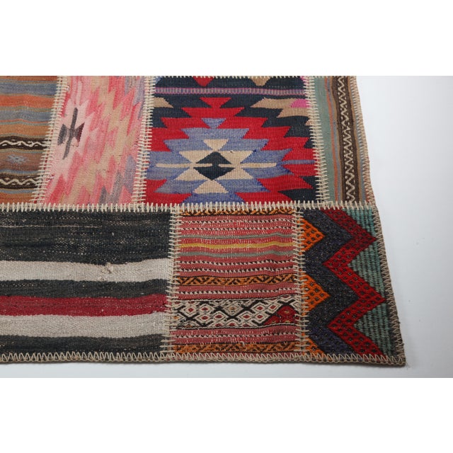 Mid 20th Century Mid 20th Century Bohemian Turkish Kilim Patchwork Rug With Tribal Motifs -5' 7'' X 9' 10'' For Sale - Image 5 of 12