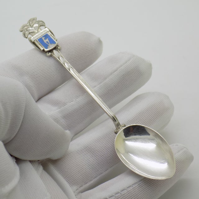 A vintage Austrian silver souvenir spoon from the 1970s and 1980s, finely crafted and hallmarked 900. The spoon carries...