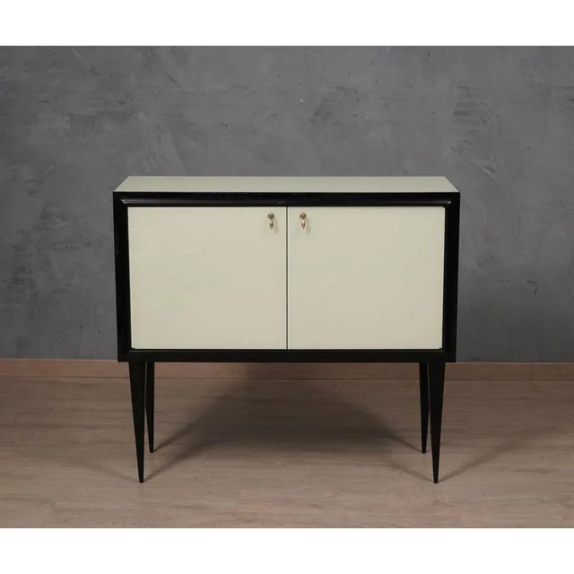 A unique sideboard of its kind for originality and for the choice of materials. Simple but refined design, the inside is...