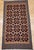 Celebrate the beauty of traditional craftsmanship with this vintage Native American Navajo area rug, featuring a warm and...