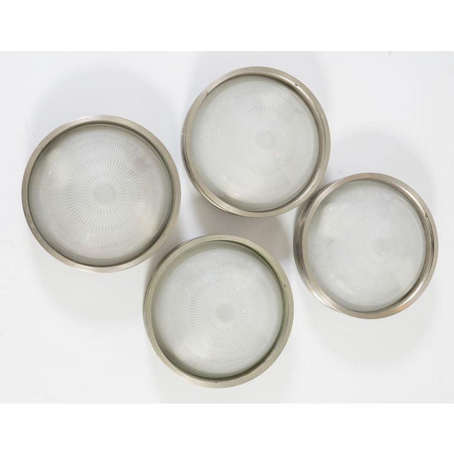 Four wall applique with metal structure and 'Sigma' model glass lampshade. Prod. Artemide, Italy, ca. 1960, designed by...