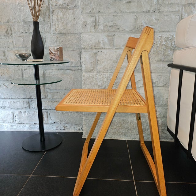 A striking example of the iconic geometric folding chair associated with Aldo Jacober’s celebrated Trieste design. As a...