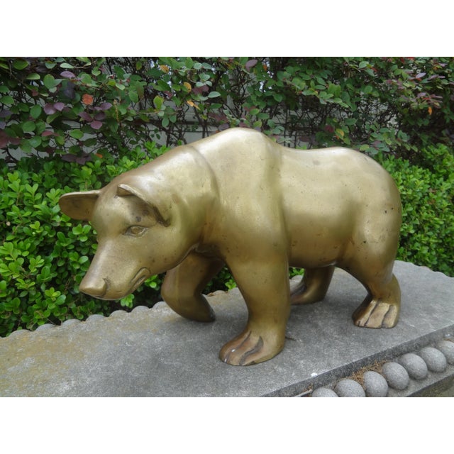 Large brass bear sculpture. Our large Hollywood Regency brass bear is beautifully executed and would make a great coffee...