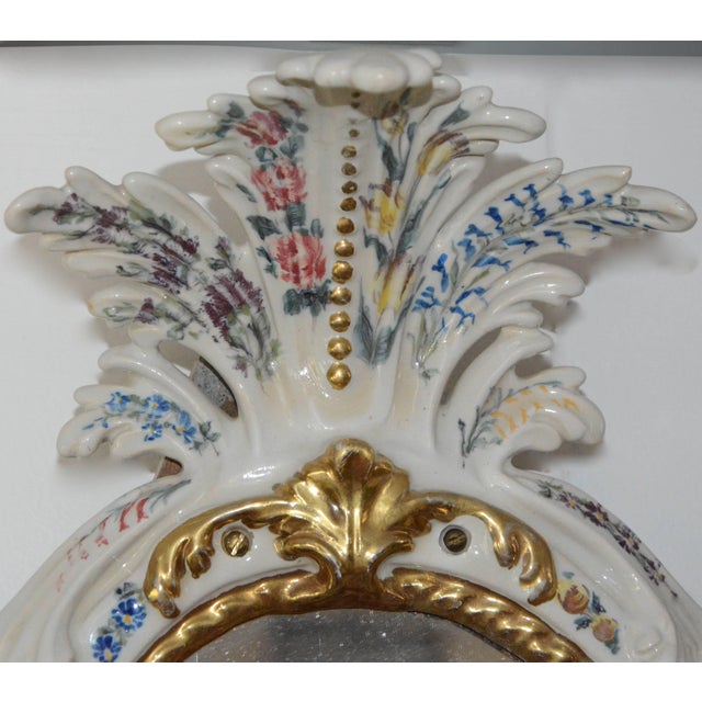 Amazing pair of porcelain hand-painted mirrors. The manufactory is the Antonibon located in Nove in the vicinity of...