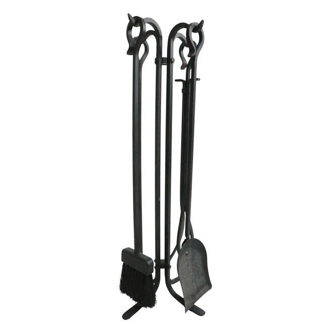 5 pc. hand forged iron fireplace tool set to include a poker, shovel, brush, tongs, and the stand. This heavy and well...
