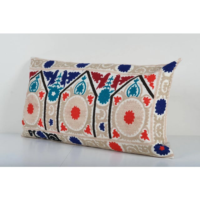 Uzbek Suzani Pillow Cover Elevate your home decor with our Turkish Suzani Pillow Cover, featuring exquisite vintage Uzbek...