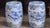 Pair of blue and white porcelain garden stools of barrel form, painted with striding dragons among flowering branches...