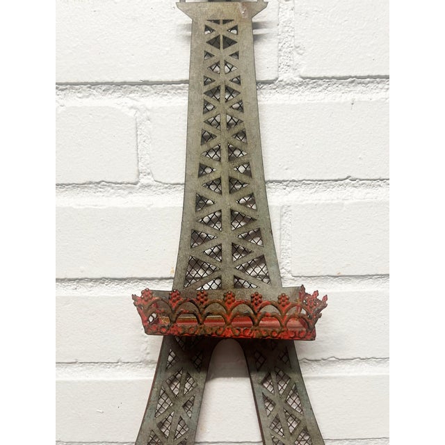 Vintage Metal Eiffel Tower for Wall with 2 Shelves measures 22”tall. x 3 “ deep This is quite an unusual and charming...
