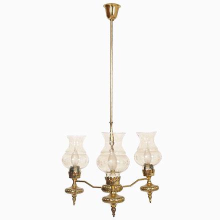 1930s Art Deco chandelier three lights in golden brass and Murano glass engraved and decorated by hand; with restored...