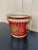 A wonderfully charming early 20th century French tole cachepot finished in a rich cinnabar red with delicate gilt...