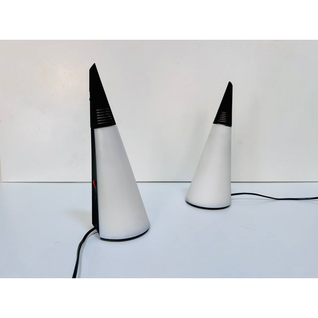 The sophisticated Nemo Iota is a minimalist table lamp from Italy, designed in 1994 by Hikaru Mori for the renowned...