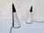 The sophisticated Nemo Iota is a minimalist table lamp from Italy, designed in 1994 by Hikaru Mori for the renowned...