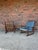 Pair of mid-century lounge chairs by Selig. These chairs feature solid walnut frames with an open lattice back design and...