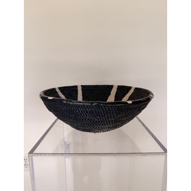 Bring sculptural texture to your home with this contemporary decorative wall bowl, crafted from ceramic with a beautifully...