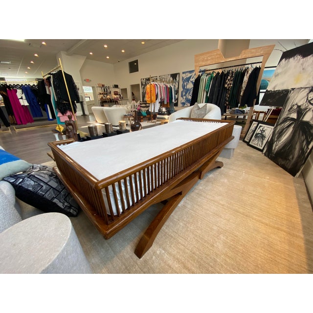Wood Daybed with cushion. Decorative pillows are not included.