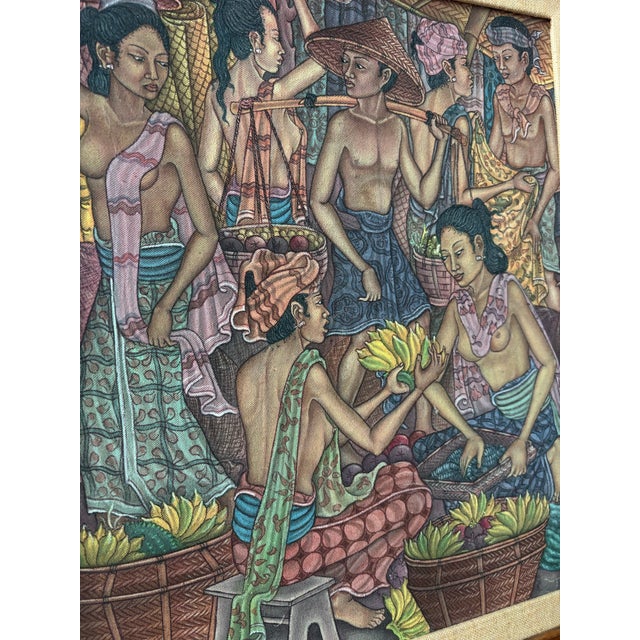 Balinese traditional painting in the Ubud style. Framed vintage Balinese market scene painting on canvas depicting local...