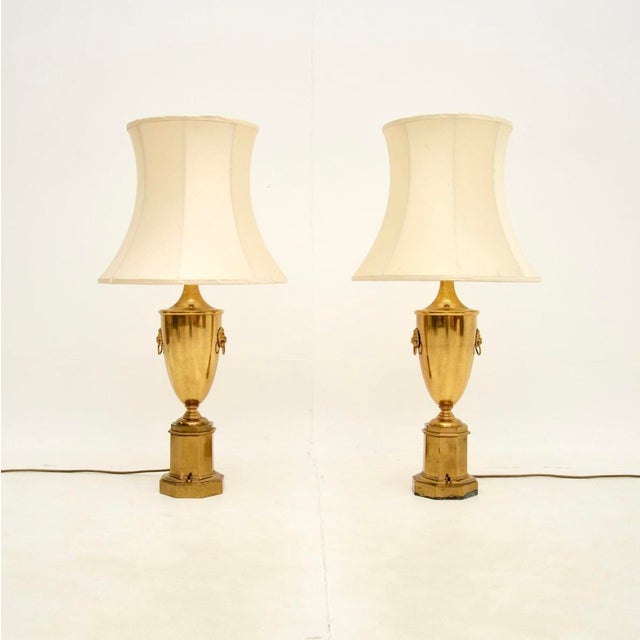 A stunning pair of antique neoclassical brass table lamps. They were made in England, they date from around the 1930’s....