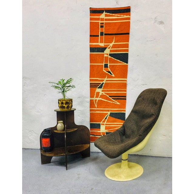 Handwoven, vintage, wool design wall hanging in orange colour
