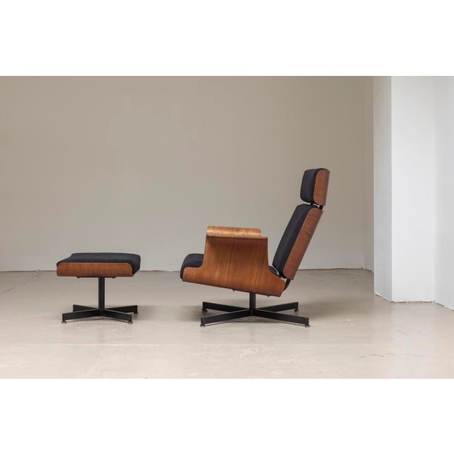 Two Helsinki chairs with matching hocker designed by Pierre Guariche and produced by Meurop in Belgium. As far as we know...