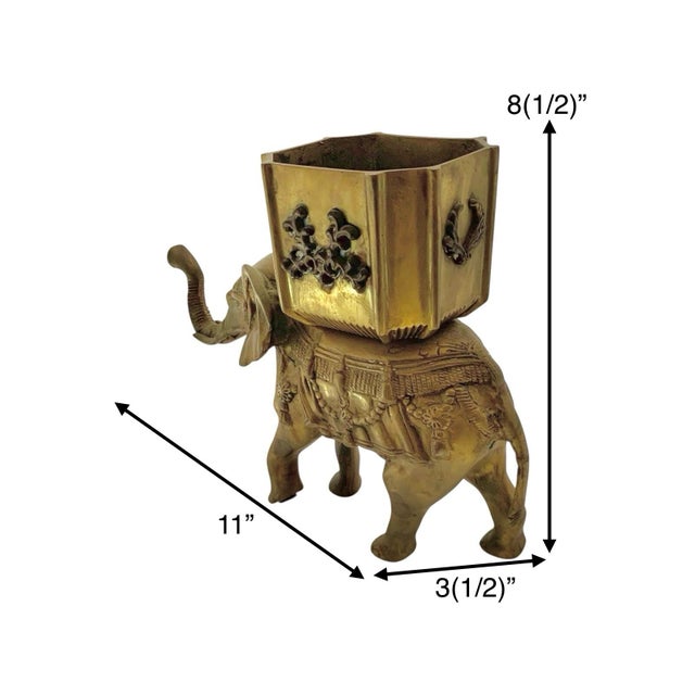 Unique pair of heavy brass elephant statues with wild animal charm. Indian folk-art warmth for shelves and tabletops....