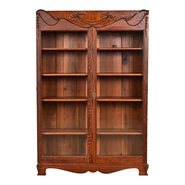 R. J. Horner Style Antique Victorian Carved Oak Bookcase, Circa 1890s For Sale