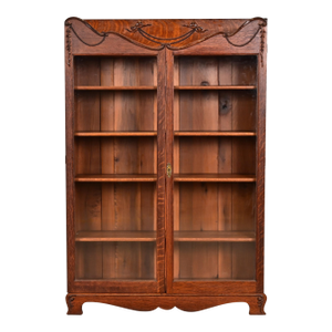 R. J. Horner Style Antique Victorian Carved Oak Bookcase, Circa 1890s