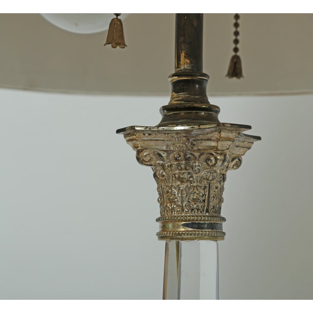 Hand blown cut solid glass columnar lamp. The shaft is slice cut with six sides, which sits on a round base and three...