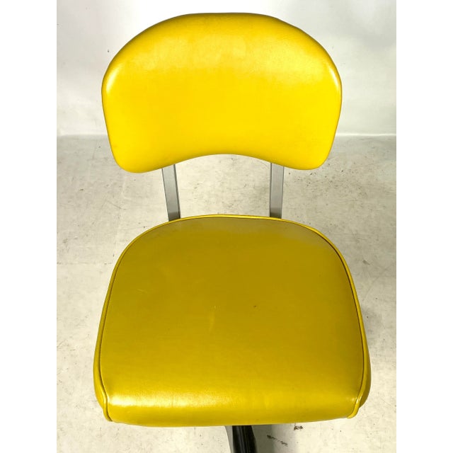 Introducing a beautifully crafted vintage Steel office chair that offers the convenience of swiveling. This exceptional...