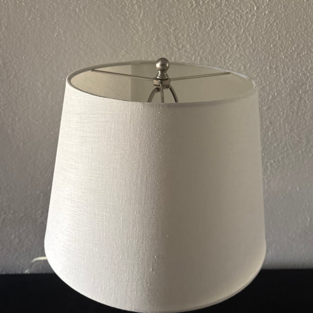Classic transitional design crystal glass table lamp with a crisp, white linen shade Bulb Base E26/Medium (Standard) Cord...