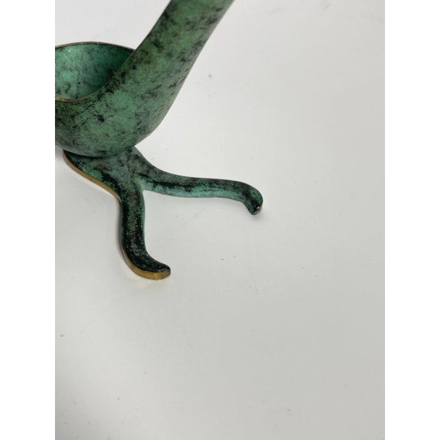 It is a pipe holder, in patinated bronze in green and gold color. This pipe holder was made in USA in the 1960s by Walter...